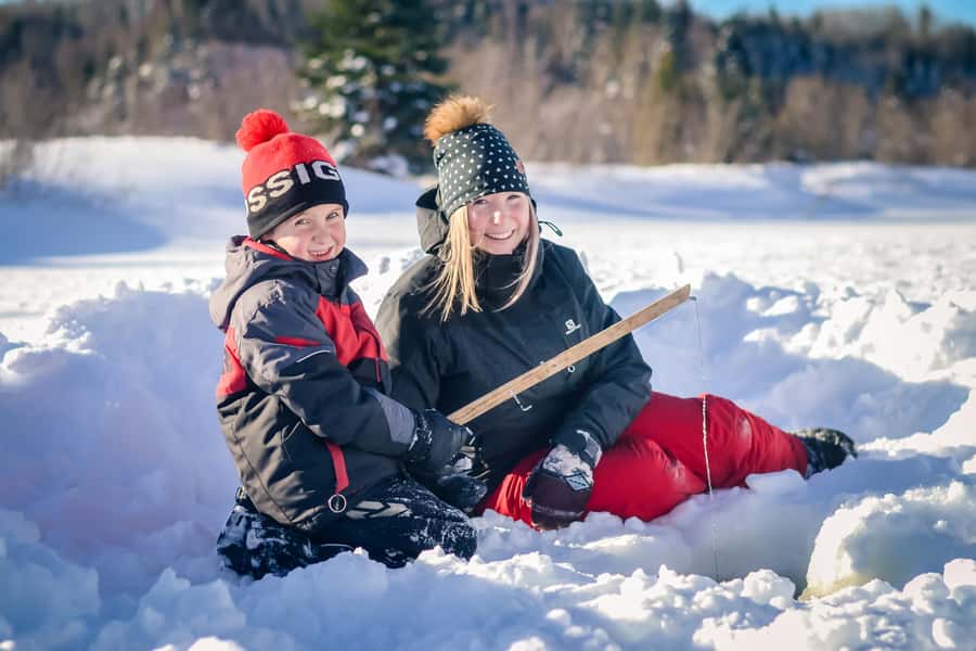 15 min. Tadoussac : Family-Friendly Ice Fishing Experience - What to wear for winter success (and when the $20 rental helps)