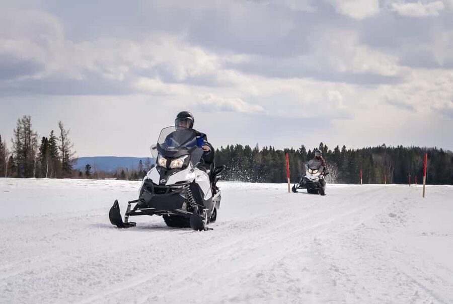 15 min. Tadoussac: Snowmobile Expedition in Saguenay Fjord - What the snowmobile day feels like, from briefing to return