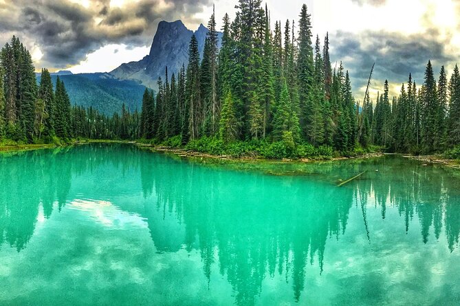 8 Iconic Stops. 12 Comfy Seats. See Banff's Best in First Class. - Lake Louise and Moraine Lake: the turquoise stars and the timing trick