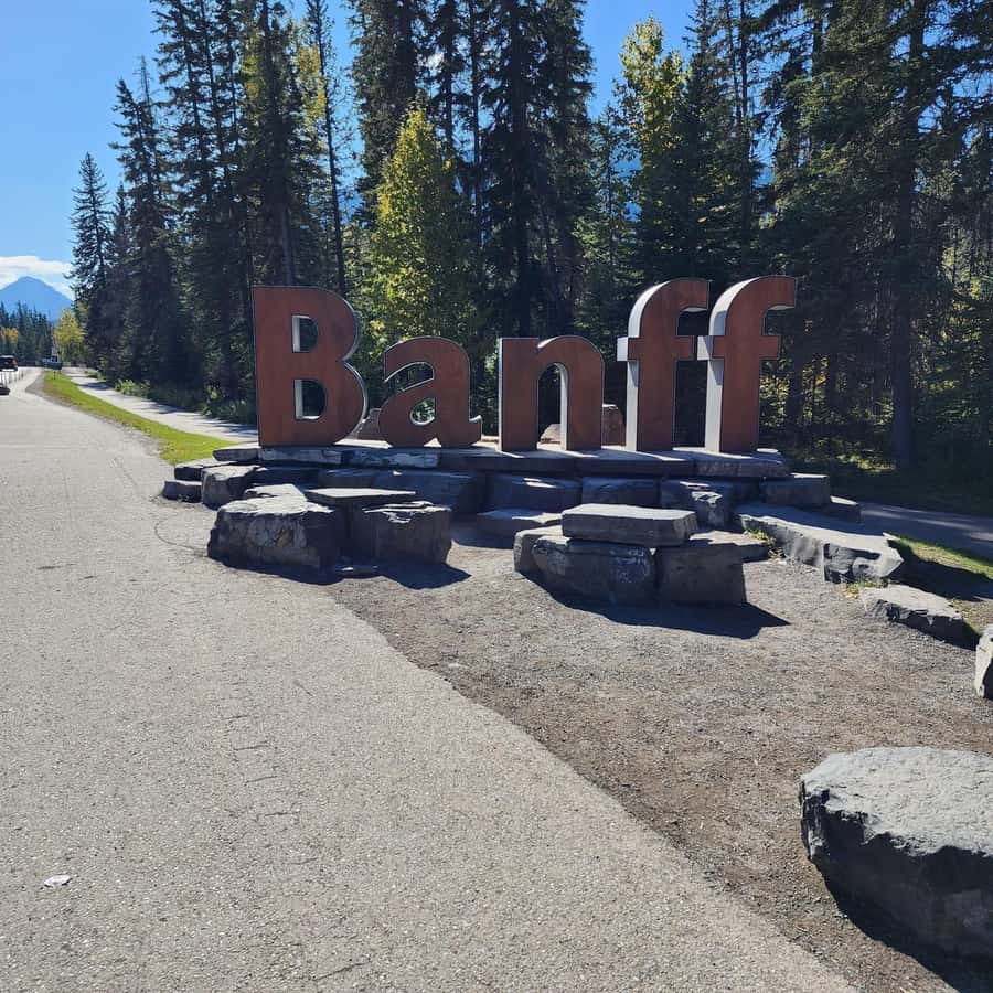 Banff: Gondola, Hot Springs, Bow falls & Three Lakes Tour - Cascade of Time Garden and the Bow Falls punch