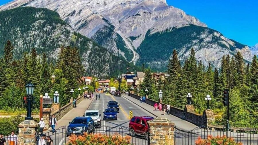 Banff: Gondola, Hot Springs, Bow falls & Three Lakes Tour - Surprise Corner Viewpoint and Banff Springs Hotel framing