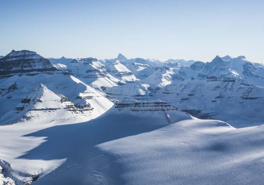 Banff/Jasper: Canadian Rockies Helicopter & Snowshoe Tour - Landing on 2 Meters of Snow: Meadow or River Confluence