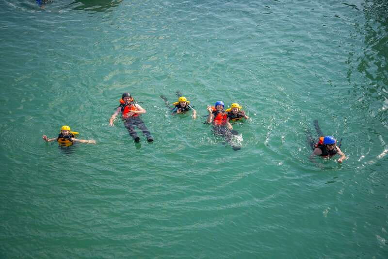 Banff: Kananaskis River Whitewater Rafting Tour - Safety Briefing and Paddling Commands Around the Demo Raft