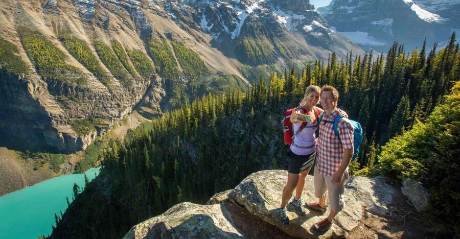 Banff National Park: Hop-On-Hop-Off Bus Day-Pass - Yellow school bus comfort, with a driver and host on board