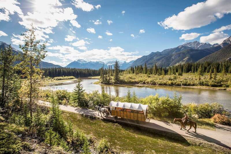 Banff: Wagon Ride with Cowboy Cookout BBQ - Riding the Bow River: calm views and real Banff wildlife odds
