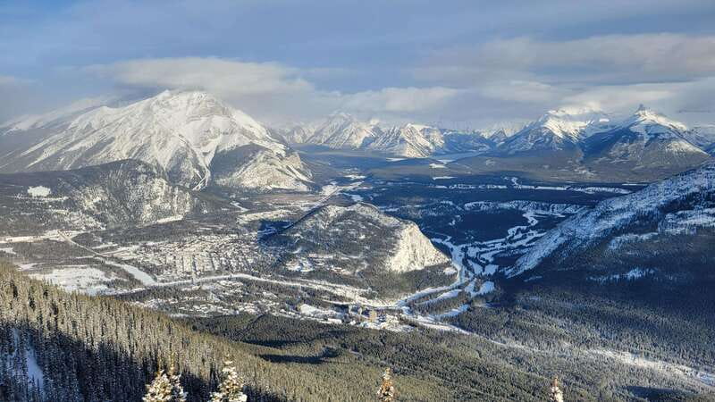 Calgary: Canmore, Banff, Lake Louise - Gondola Included - Banff Avenue and Bow Falls: town time plus a quick, photogenic reset