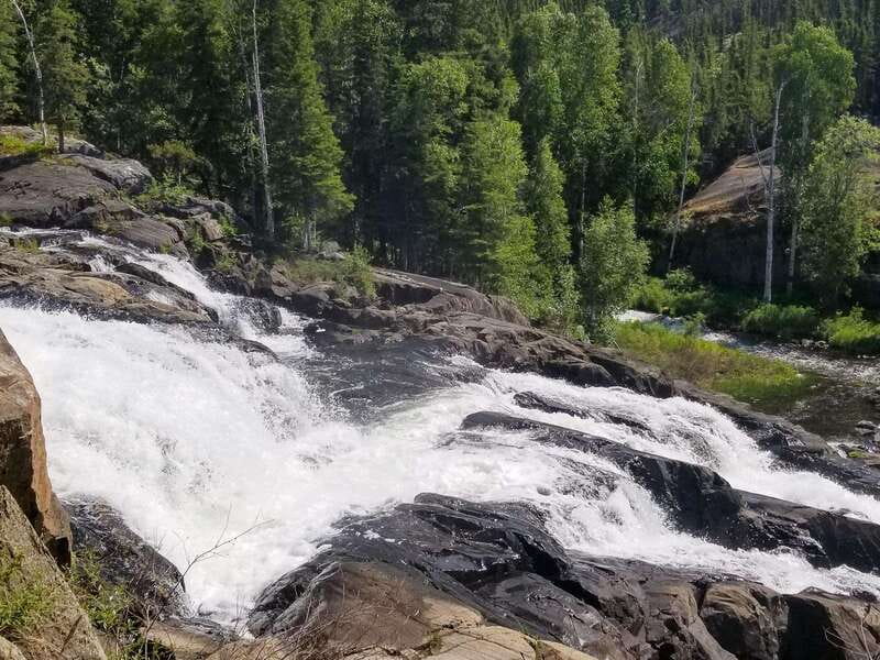 Cameron Falls Waterfall Tour - Safety gear matters: bear bangers, bug repellent, and practical supplies