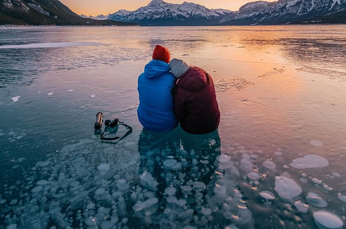 Canadian Rockies Abraham Lake Ice Bubbles Helicopter Tour - Fire, Marshmallows, Coffee, Then Back Toward Abraham Lake