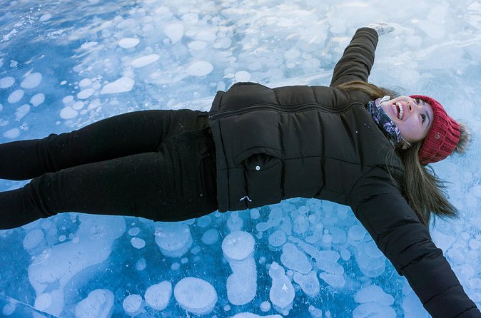 Canadian Rockies Abraham Lake Ice Bubbles Helicopter Tour - Weather Reality: If Conditions Change, Your Experience Changes Too
