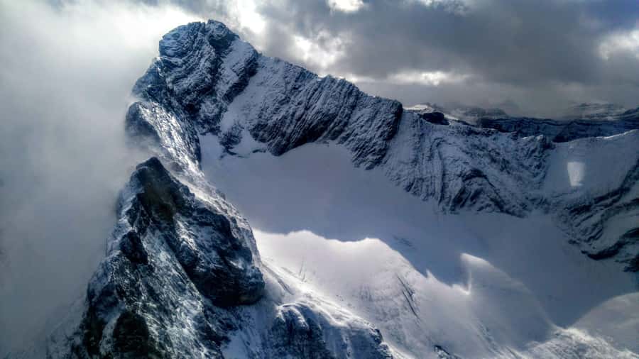 Canmore: 25-Minute Three Sisters Helicopter Tour - Bow River to Three Sisters Pass: The Canmore Skyline Moment