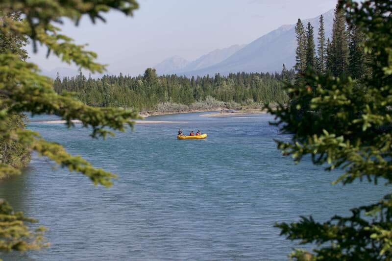 Canmore: Bow River Scenic Float Tour - Glacial-blue Bow River views and the Rockies just beyond the trees