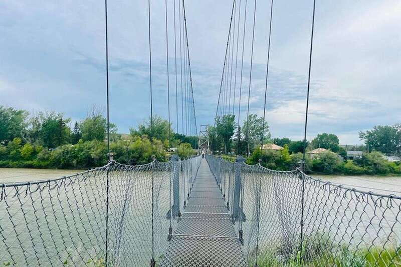 Day of Dinosaurs and Hoodoos From Calgary to the Badlands - Suspension bridge time, river views and a quick taste of adventure
