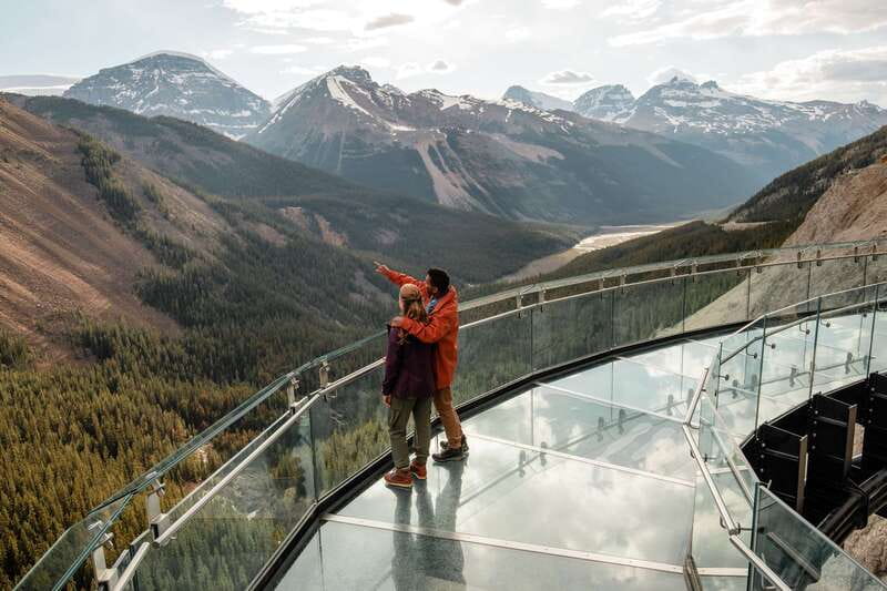 From Banff: Columbia Icefield Tour with Glacier Skywalk - Ice Explorer on the Athabasca Glacier: the ride that turns a drive into ice time