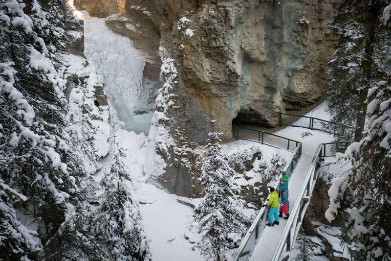 From Banff: Johnston Canyon Guided Icewalk - Lower Falls: The Tunnel and Frozen Waterfall Moment