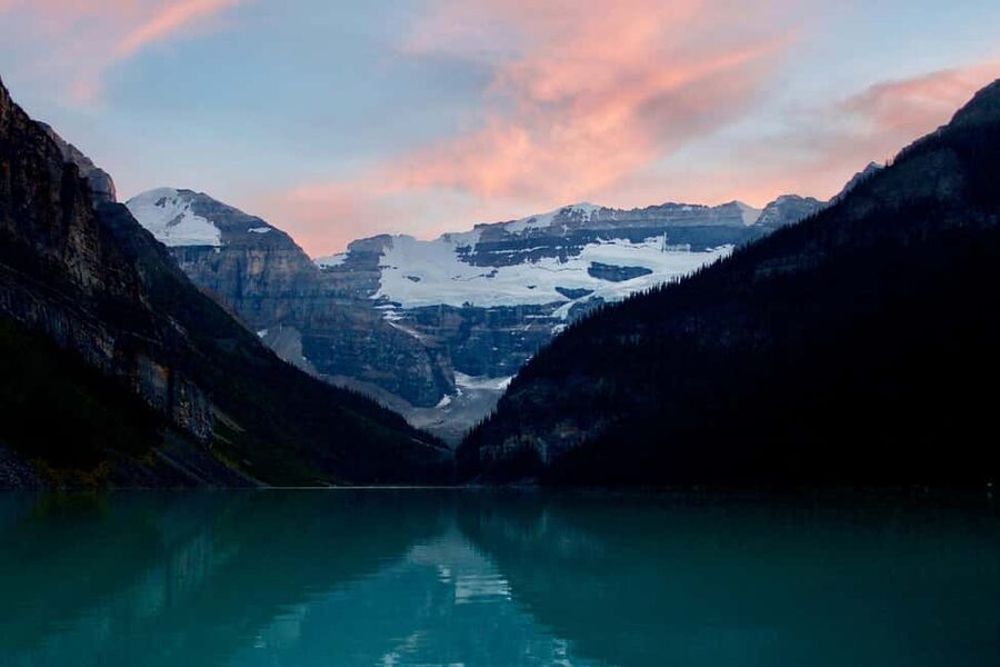 From Banff: Sunset Lake Louise, Moraine Lake & Wildlife Tour - Moraine Lake at golden hour, turquoise reflections and Ten Peaks views