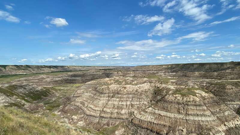 From Calgary: Canadian Badlands Private Geological Tour - The World’s Largest Dinosaur and the Little Church for classic Drumheller stops