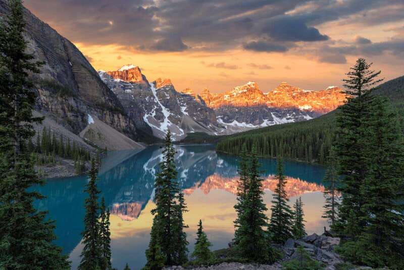 From Canmore/Banff: Moraine Lake Sunrise & Lake Louise Tour - Pickup to the van ride: where the day starts calm