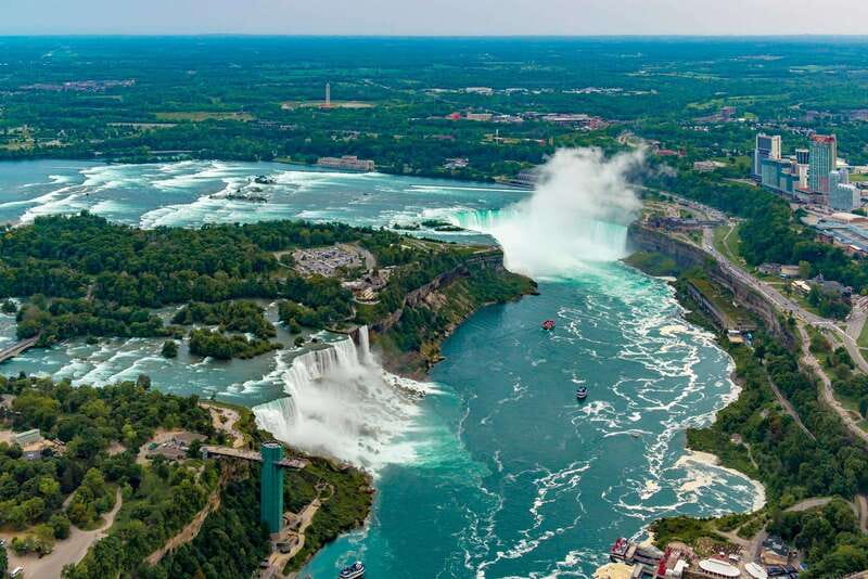 From Montreal: Toronto, Niagara Falls & 1000 Islands Tour - Day 1: Thousand Islands cruise or SkyWheel, then Niagara Falls in multiple modes