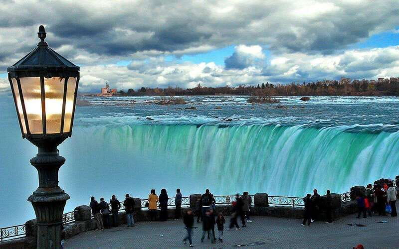 From Niagara Falls Canada Tour Boat, Lunch, Journey, Skylon - Niagara Falls drive highlights: Floral Clock, Dufferin Island, Whirlpool Rapids, and more