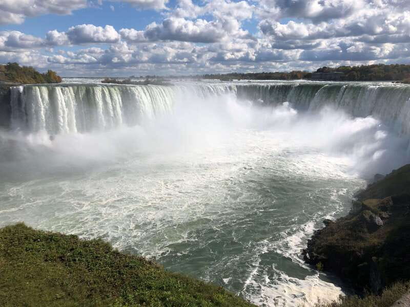 From Toronto: Niagara Falls Full-Day Tour - Floral Clock and hydro-power: pretty photos with real context