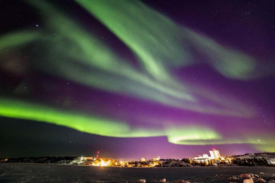 From Yellowknife:4-Day Aurora Viewing Tour with Hotel Pickup - Yellowknife airport pickup and your comfortable base at Chateau Nova