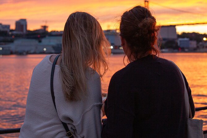 Halifax Sunset Cruise Ft. a Live Musician - Harbourwalk at sunset: ships, lights, and a very Halifax kind of energy