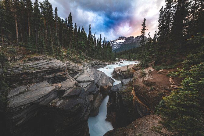Icefields Parkway Highlights & Secrets | Award-Winning Adventure - Bow Lake: a neon-blue shoreline with classic glacier views