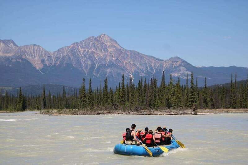 Jasper: Athabasca River Mile 5 Whitewater Rafting Tour - Getting to the put-in: town pickup, safety talk, and that 10-minute float