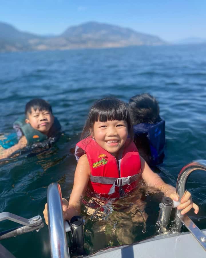 Kelowna: Private Boat Tour with Bluetooth Speaker - The swim stop on Okanagan Lake: ladder, life jackets, and a nudge to use them