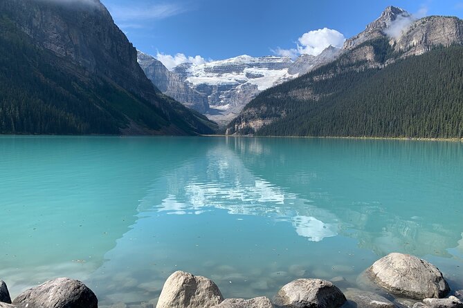 Lake Louise, Moraine Lake and the Icefields Parkway Full-Day Tour - Lake Minnewanka first: the hidden prelude before the postcard stops