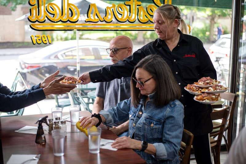 Montreal: Mile-End Foodie Walking Tour with 7 Tastings - Bagels and Greek kotopita, a menu that explains Mile End’s mix