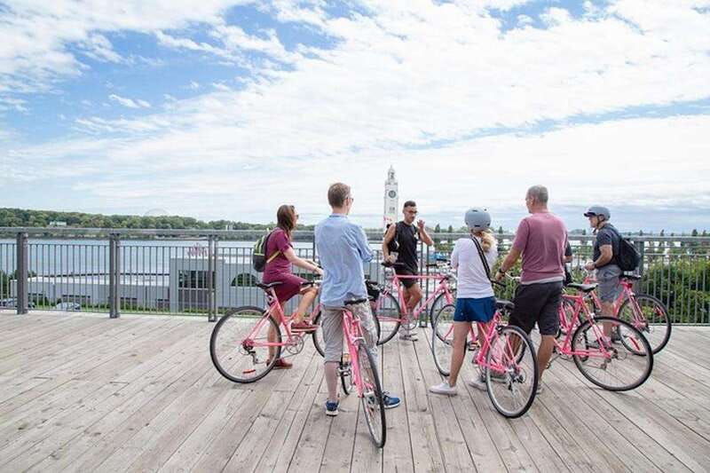Montreal: Non Touristy Pink Bike Tour - Guide Energy Matters: Chris, Félix, and Rufus in Action