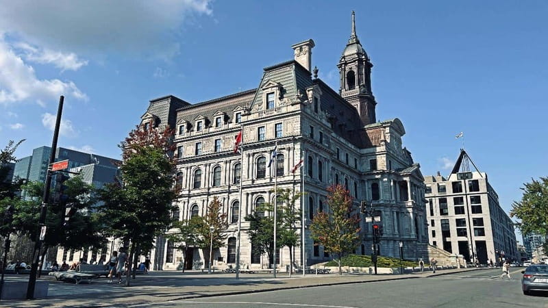 Montreal: Private 2h Walking Tour RESO and Old Montreal - Going past big institutions: banks, cathedrals, and city landmarks