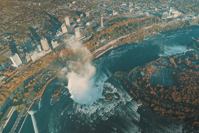 Niagara Falls Canada Tour: Helicopter, Boat, Behind Falls & Lunch - Journey Behind the Falls: the tunnels that make Niagara feel physical