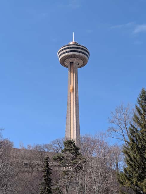 Niagara Falls: Day Tour with Boat & Journey Behind the Falls - Guided stops on the Canadian side: history, dams, and iconic viewpoints