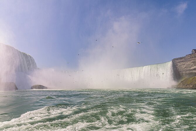 Niagara Falls Tour with Boat Ride & Journey Behind the Falls - Walking from the docks to Table Rock, and why timing matters for photos