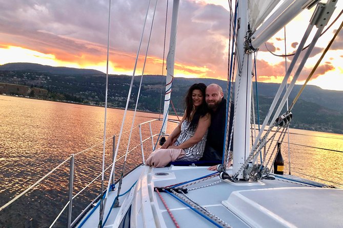 Private Kelowna Sailing Cruise on Okanagan Lake - Getting the hang of sailing with Brad at the helm