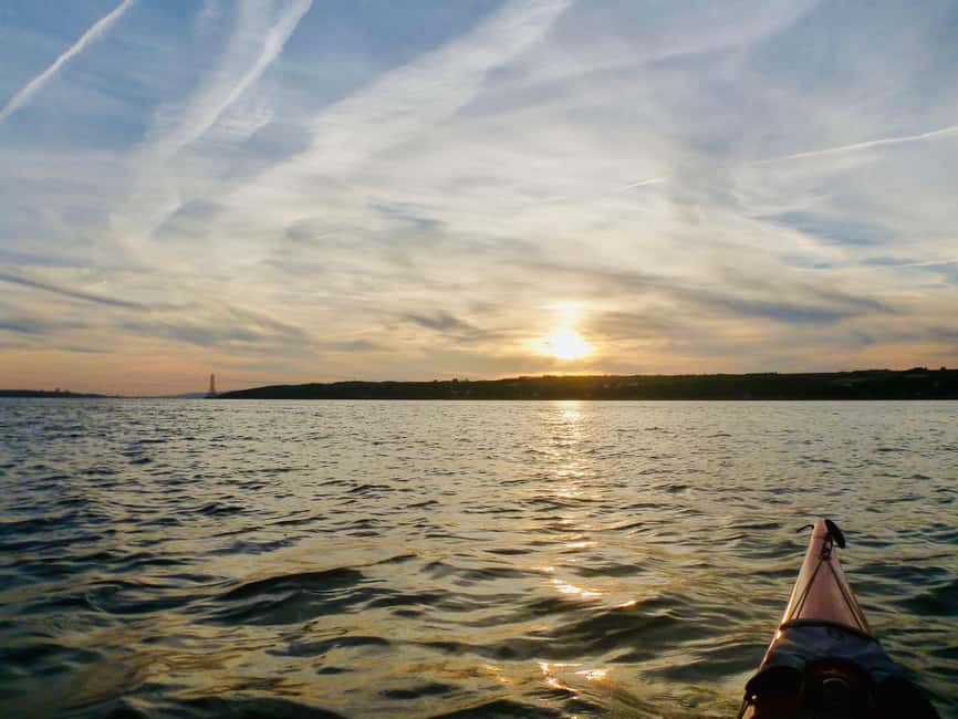 Quebec City Sunset Sea-Kayaking Tour with Mapple Wine - Paddling the St. Lawrence River toward Orléans Island