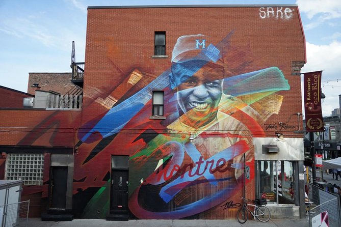 The Original Montreal Mural Arts Tour by Spade & Palacio - Stop 2: The Leonard Cohen mural as an instant cultural cue