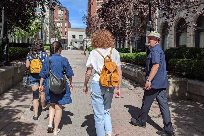 The Original Old Montréal Walking Tour by Guidatour - Place d’Armes, Royal Bank, and City Hall in one coherent sweep