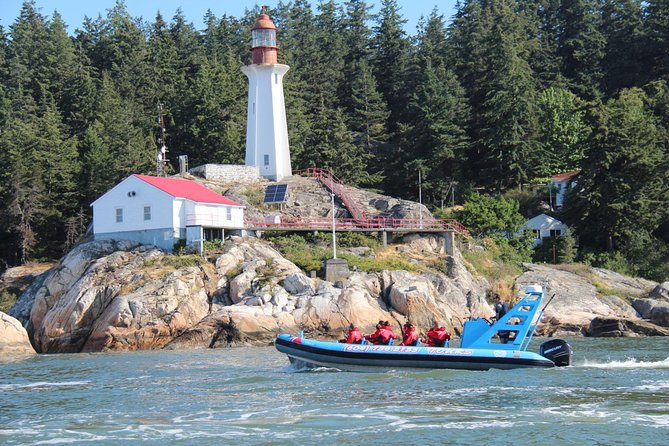 Vancouver City and Seal Colony Scenic Boat Tour - West Vancouver highlights, from Lions Gate Bridge to ocean freighters