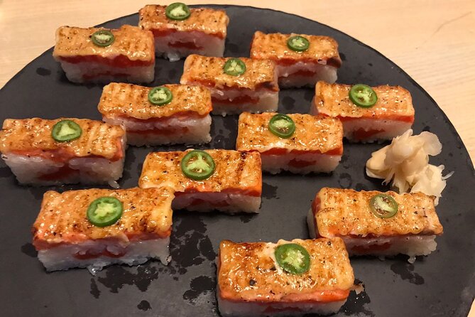 Vancouver Food Tour with 6 Tastings of Sushi, Chocolate, and more - Maple Tree Squares, Steam Clock, and Olympic torch moments that set the mood